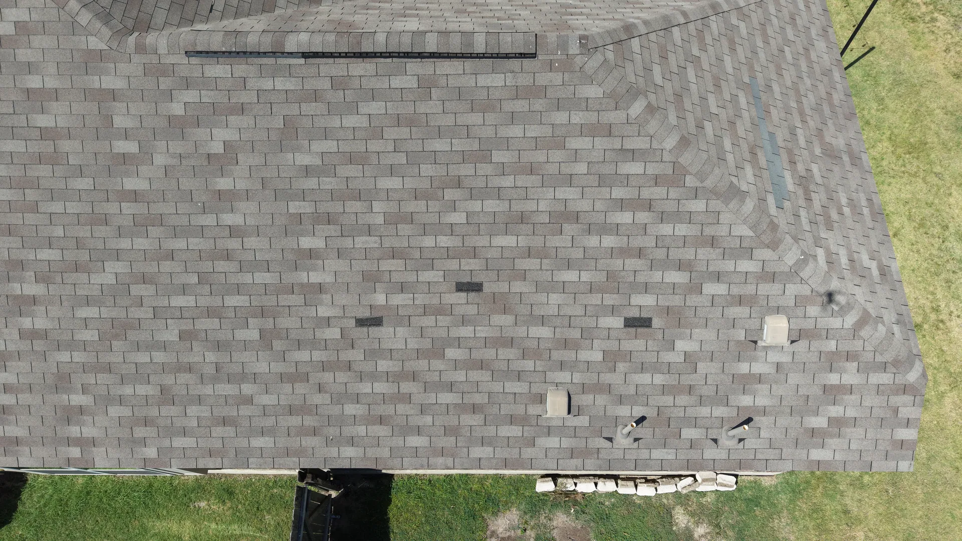 Top down drone hip roof vents, Hutto, TX
